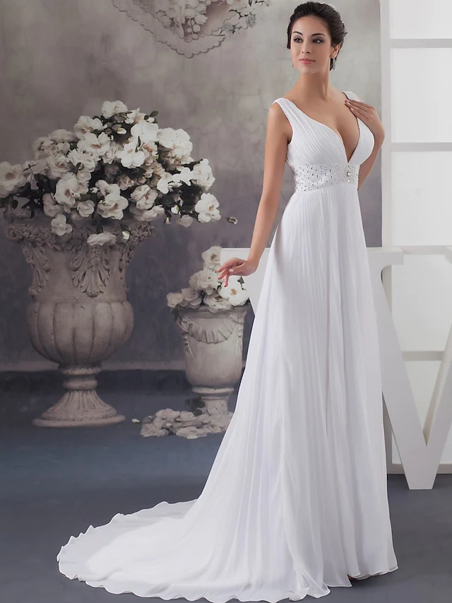 Back view of A-Line wedding dress showing chapel train and draping.