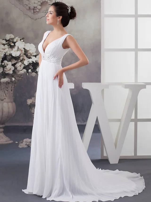Close-up of crystal beading and draping on A-Line wedding dress.