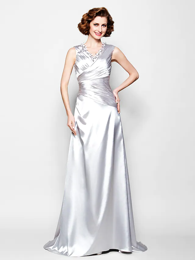 Elegant A-Line Mother of the Bride dress with V-neck and side draping.