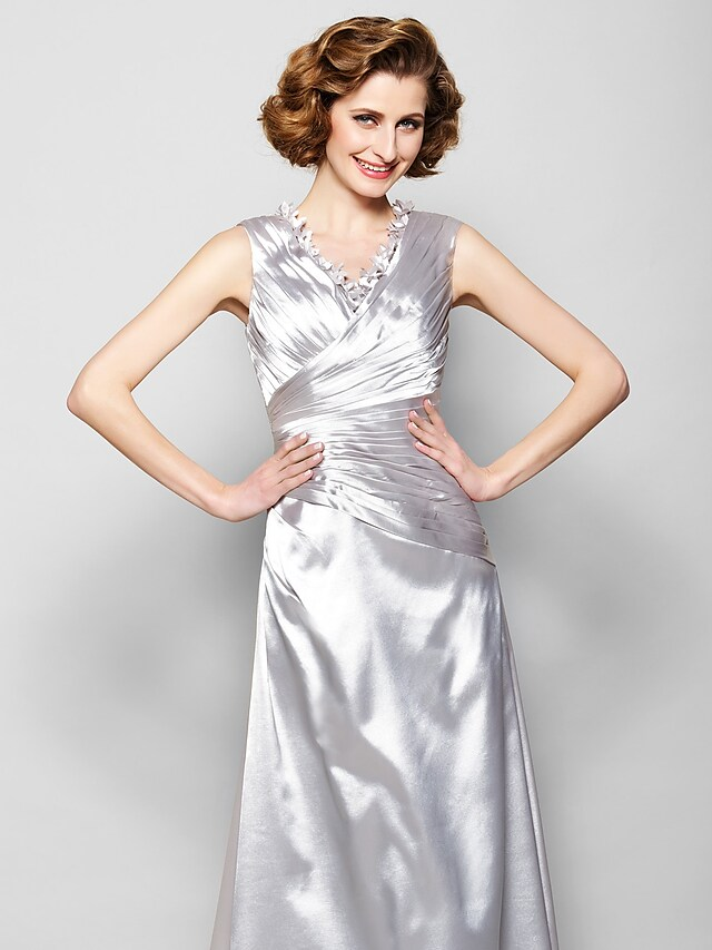 Side view of the elegant A-Line stretch satin gown.