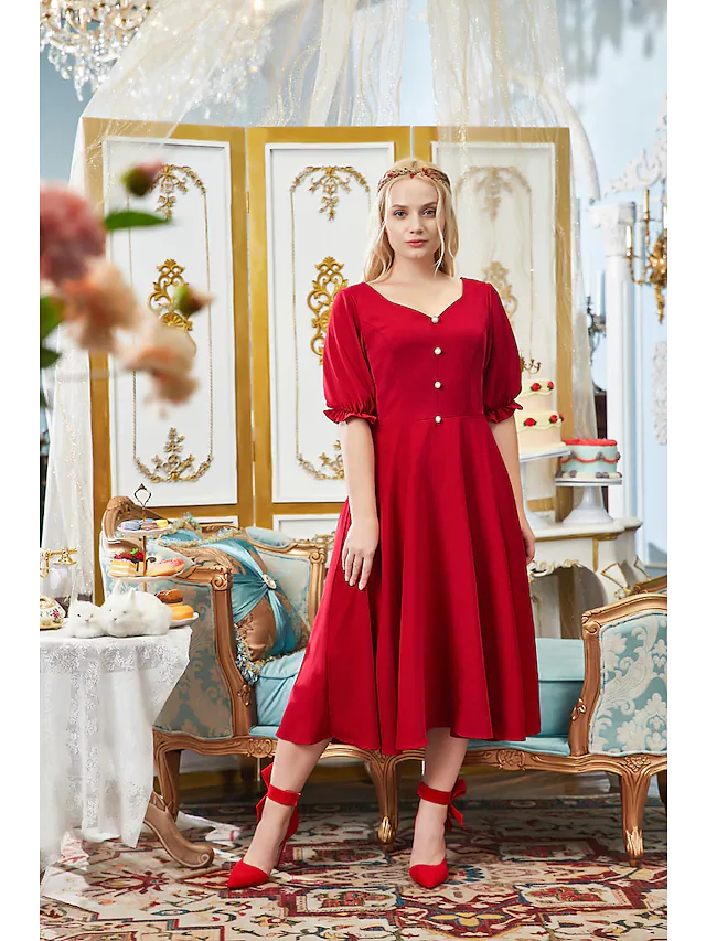 Plus size A-line dress with V-neck and half sleeves.