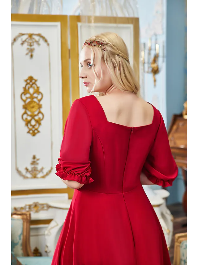 Close-up of the stretch fabric and pleats on the A-line dress.