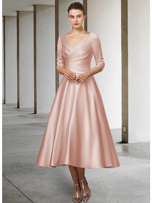 Elegant A-line V-neck satin tea length dress with half sleeves.