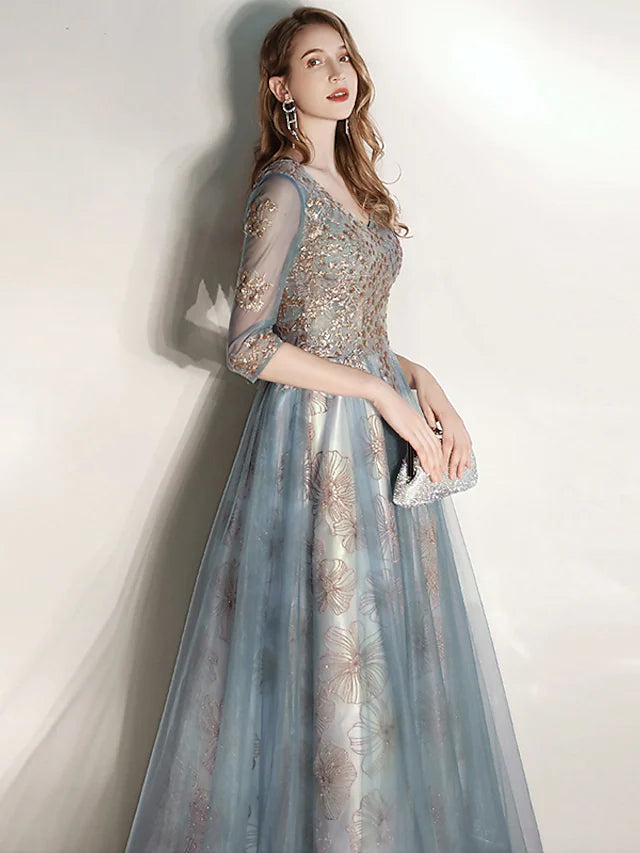 Close-up of the V-neckline and half sleeves on an A-Line dress.