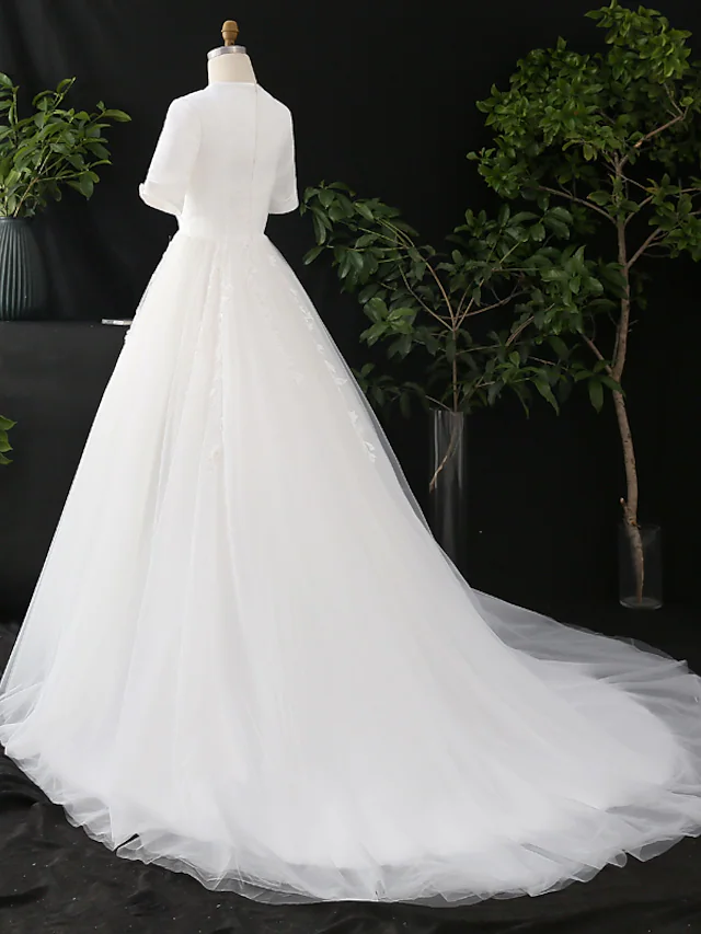 Back view of the A-line wedding dress, highlighting the court train.