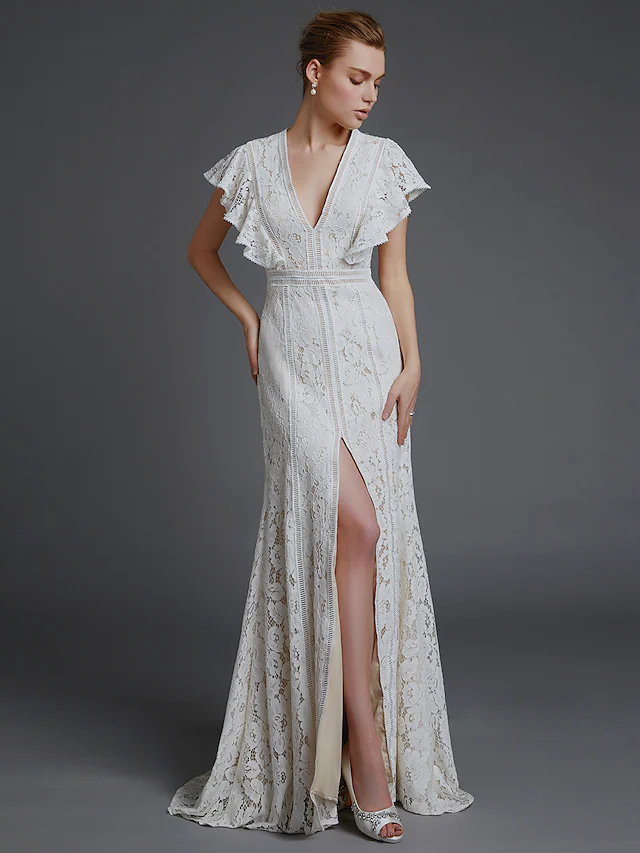Elegant A-line V-neck lace boho wedding dress with split front.