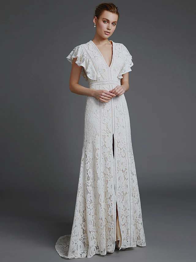 Full length view of A-line V-neck lace boho wedding dress.