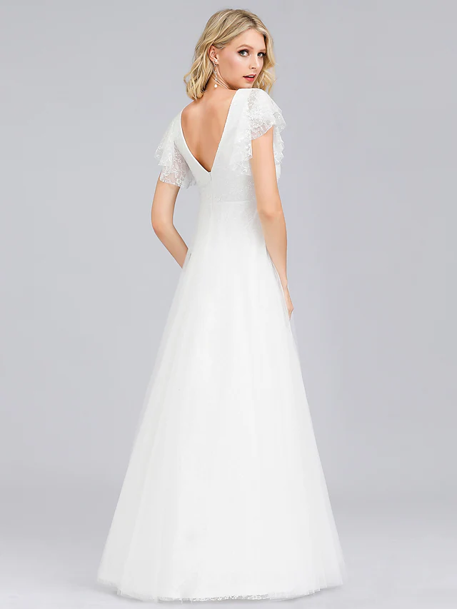 Full length view of the A-line V-neck lace wedding dress.
