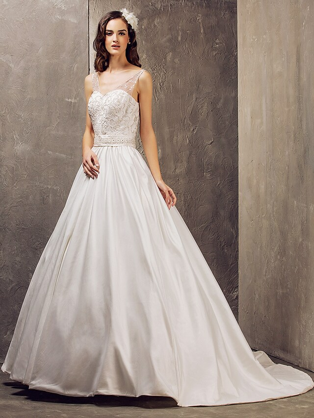 Elegant A-line wedding dress with V-neck and lace details.