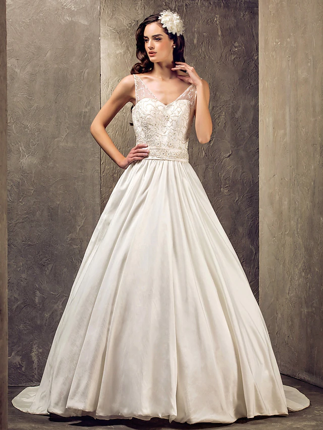 Back view of a sleeveless A-line wedding gown.