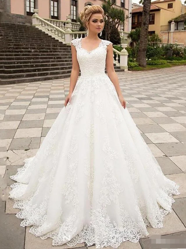 Elegant A-Line V-neck lace tulle strapless country wedding dress, front view.