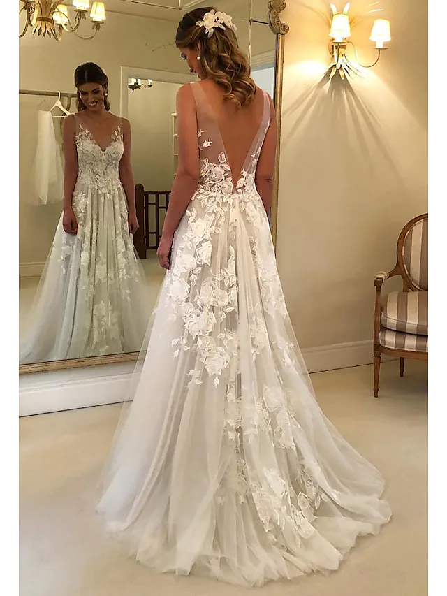 Elegant A-line V-neck lace wedding dress with delicate lace details.