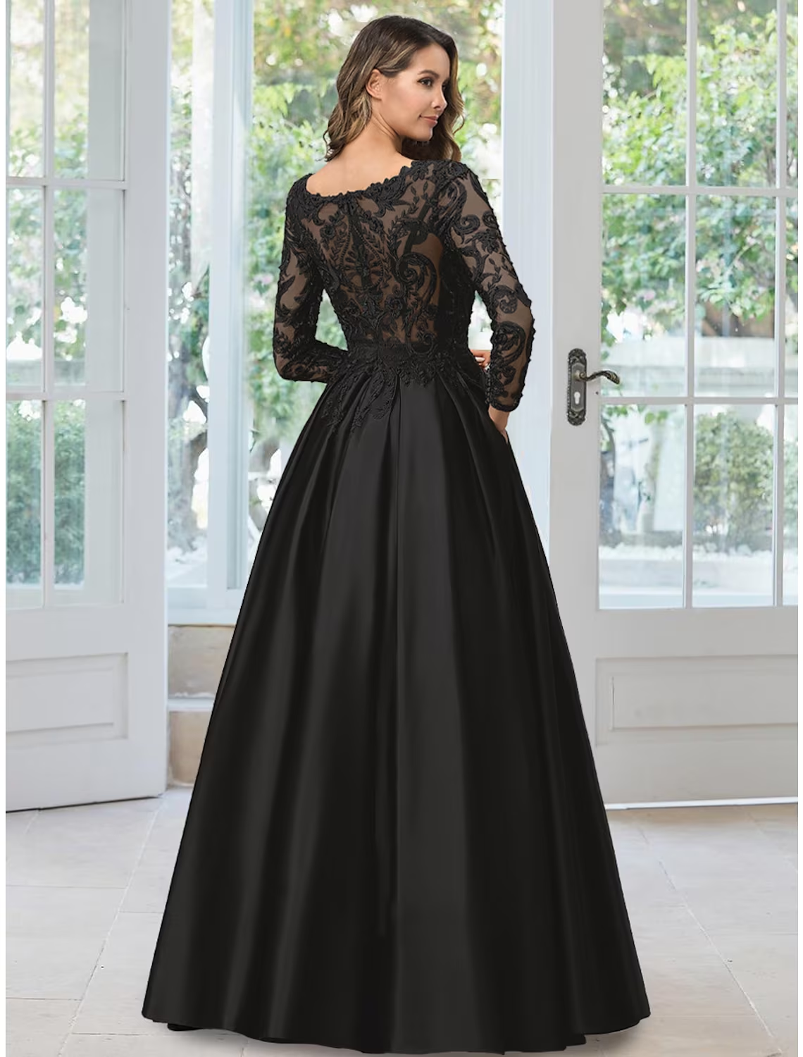 Back view of the black A-line formal dress, showcasing the floor-length design.