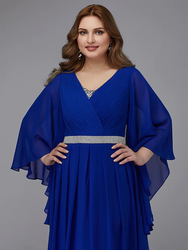 Back view of a plus size chiffon gown with lace-up detail.