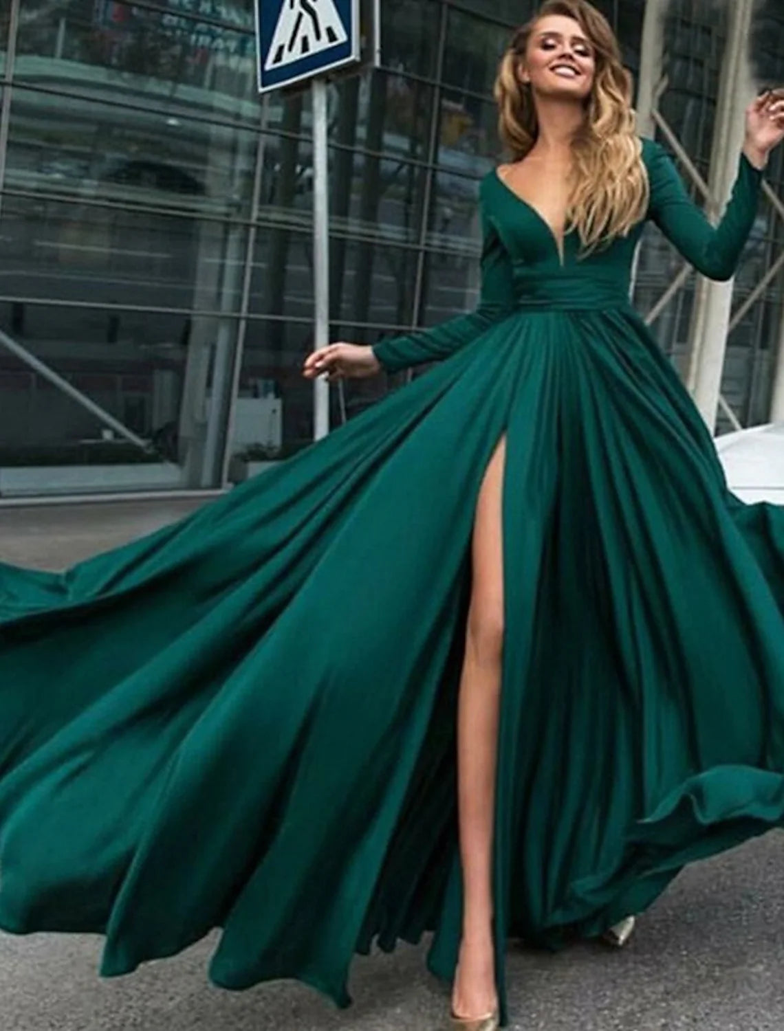 Back view of the A-line chiffon evening gown showing the V-back and slit.