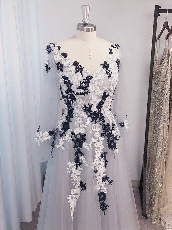 Back view of A-Line Tulle Applique Prom Dress with long sleeves.