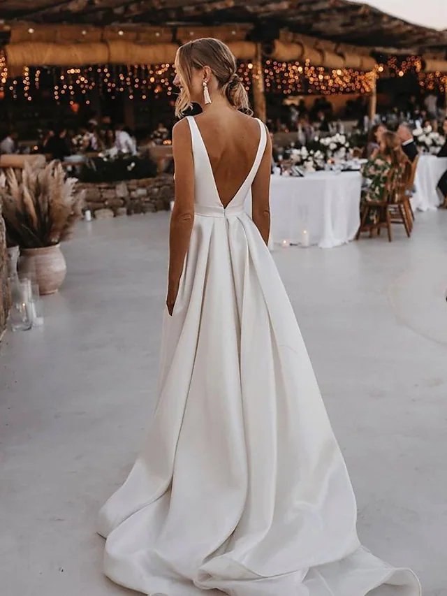Another full view of the A-line V-neck satin wedding dress.