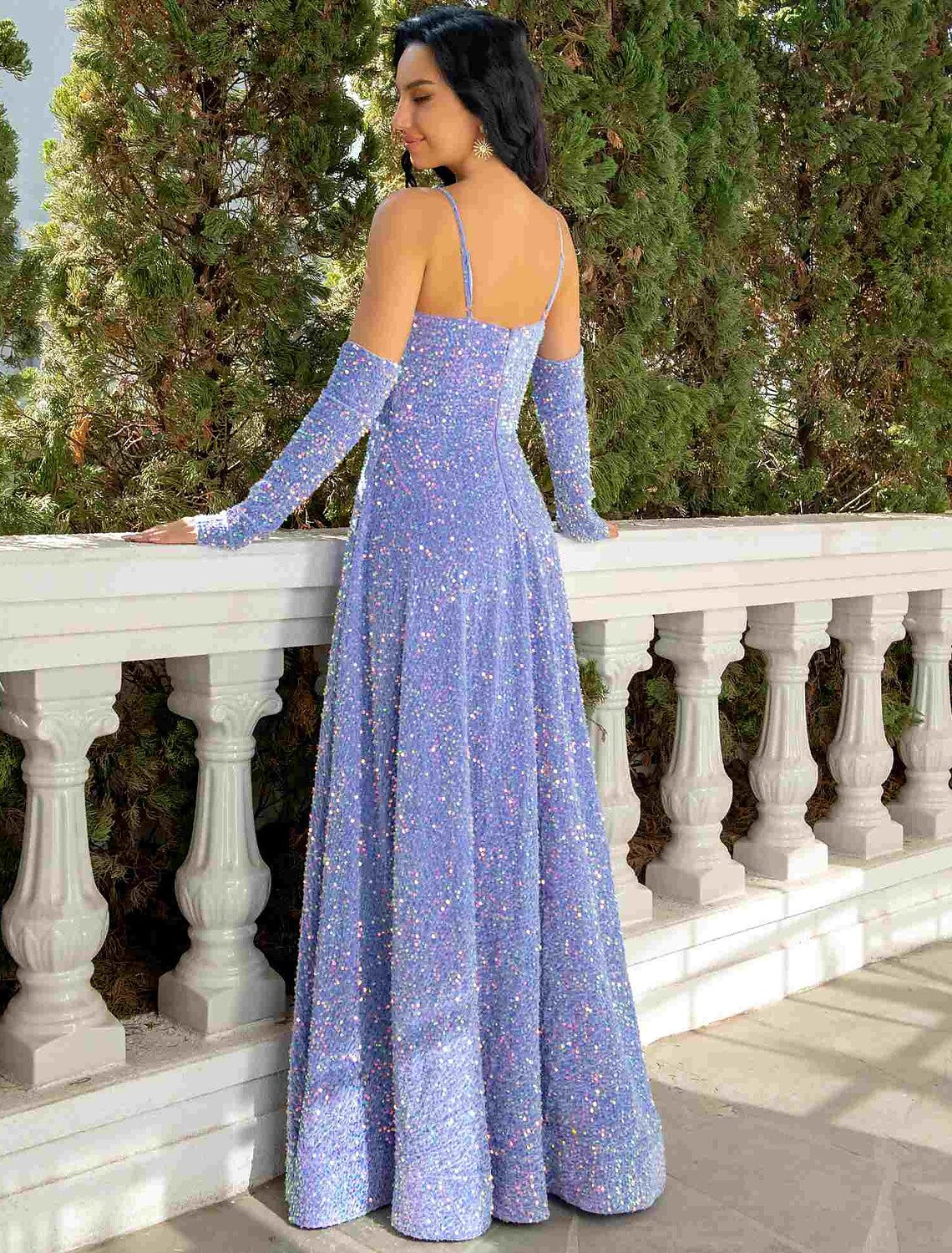 Back view of the floor-length sequined party dress.