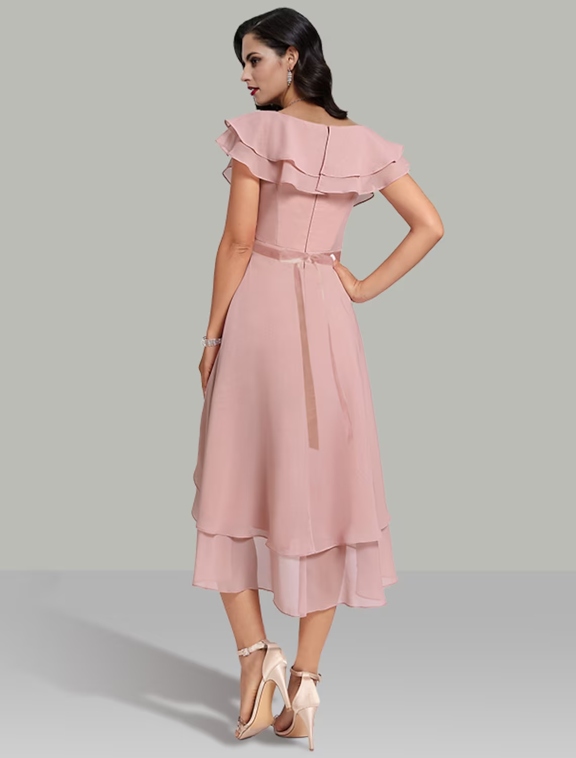 Side view of the A-line tea length dress, showcasing the tiered skirt.