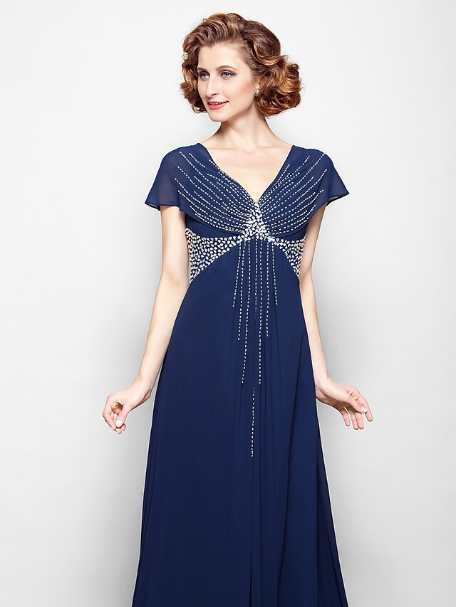 Side view of the elegant A-line Mother of the Bride gown.