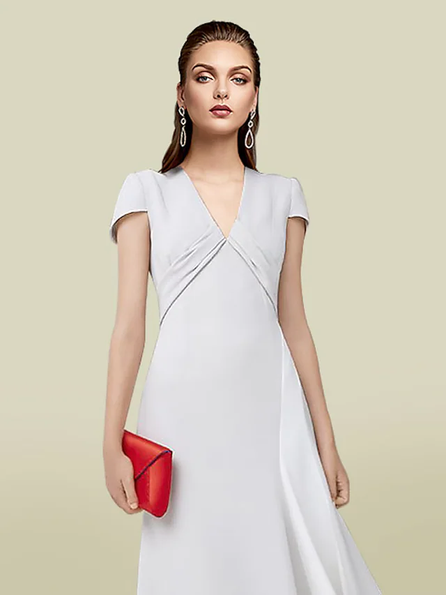 Sophisticated V-neck dress for formal occasions, showcasing the A-line cut.