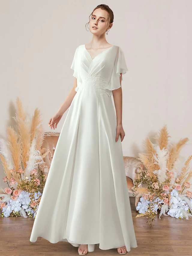Elegant A-line V-neck short sleeve wedding dress with chiffon lace and pleats.
