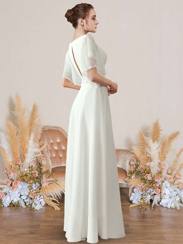 Back view of A-line V-neck short sleeve wedding dress with appliques.