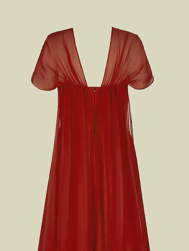 Side view of a woman in an A-line V-neck short-sleeve chiffon dress, showing the floor-length design.