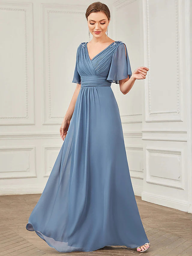 Close-up of the ruched appliques and V-neckline on the A-Line prom dress.