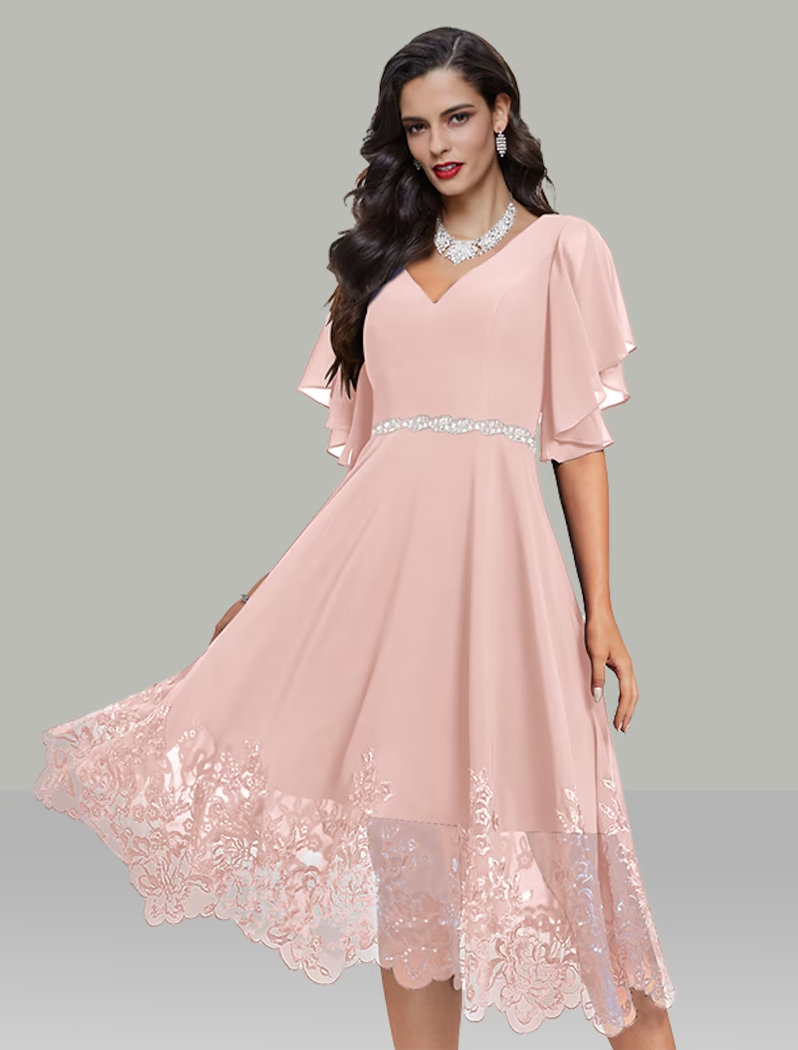 Side view of the elegant chiffon dress, showcasing the belt/sash detail.