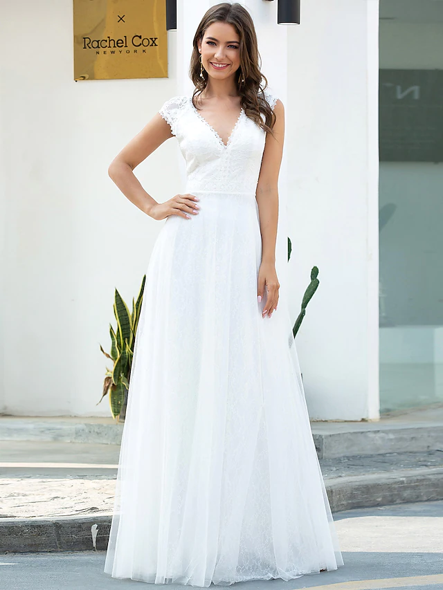 A-Line V-neck wedding dress with lace and tulle, front view.