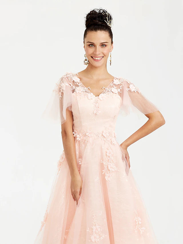 Back view of A-line tulle dress with appliques.