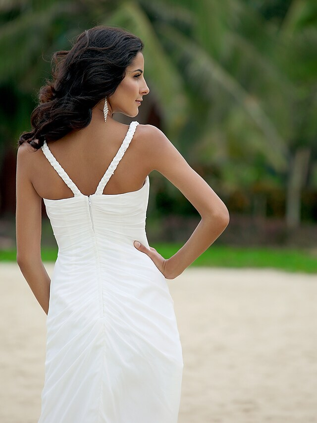 Back view showcasing the backless design of the chiffon wedding dress.