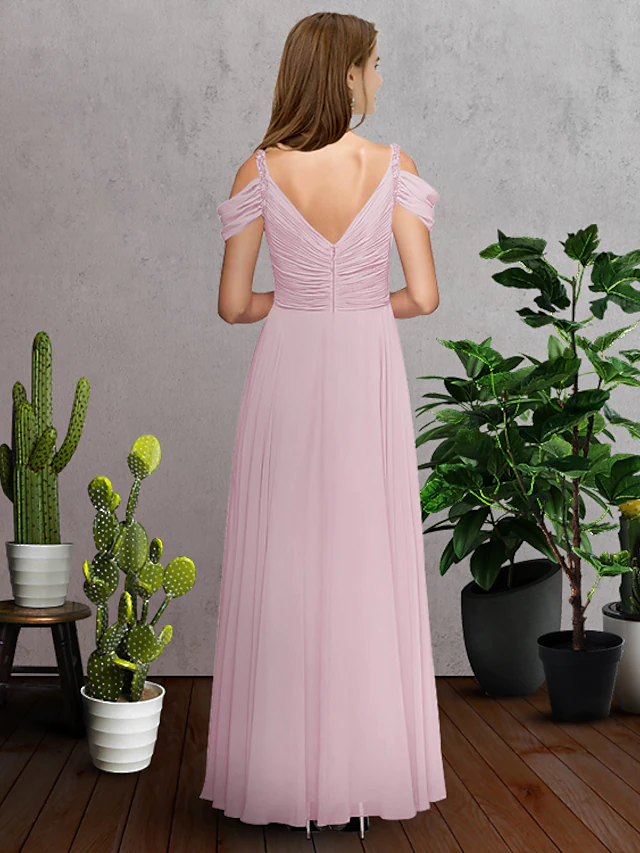 Floor-length chiffon bridesmaid dress with ruching details.
