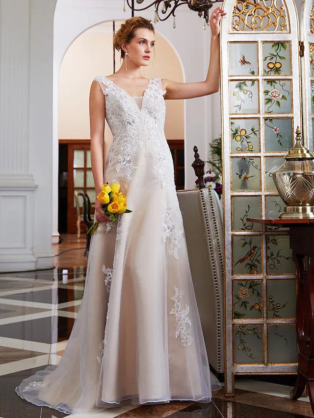 Back view of the A-Line wedding dress, highlighting the elegant court train and regular straps.