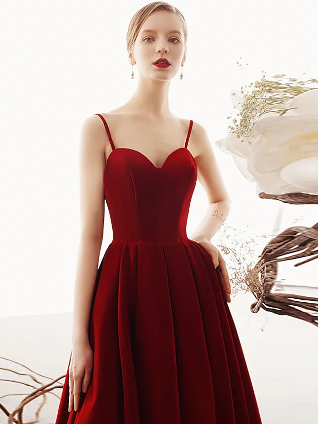 Back view of the A-line velvet dress, highlighting the beautiful back design.