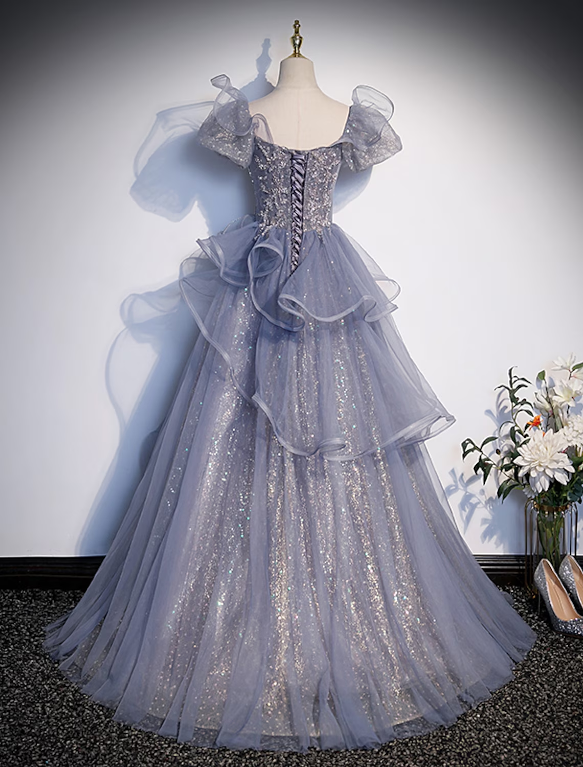 Aqua princess ball gown with short sleeves and intricate crystal details.