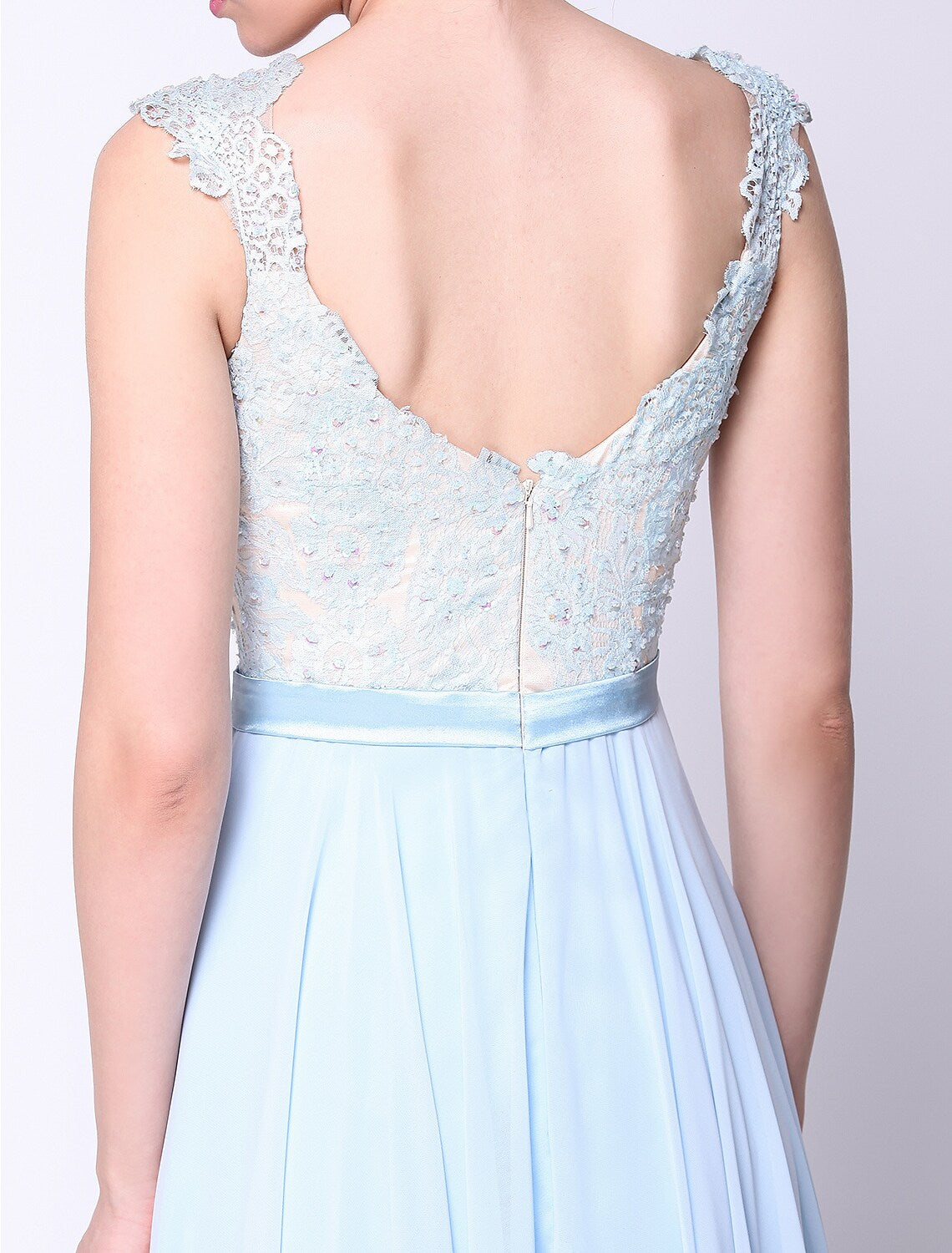 Full view of the ball gown, emphasizing its elegant silhouette and floor length.