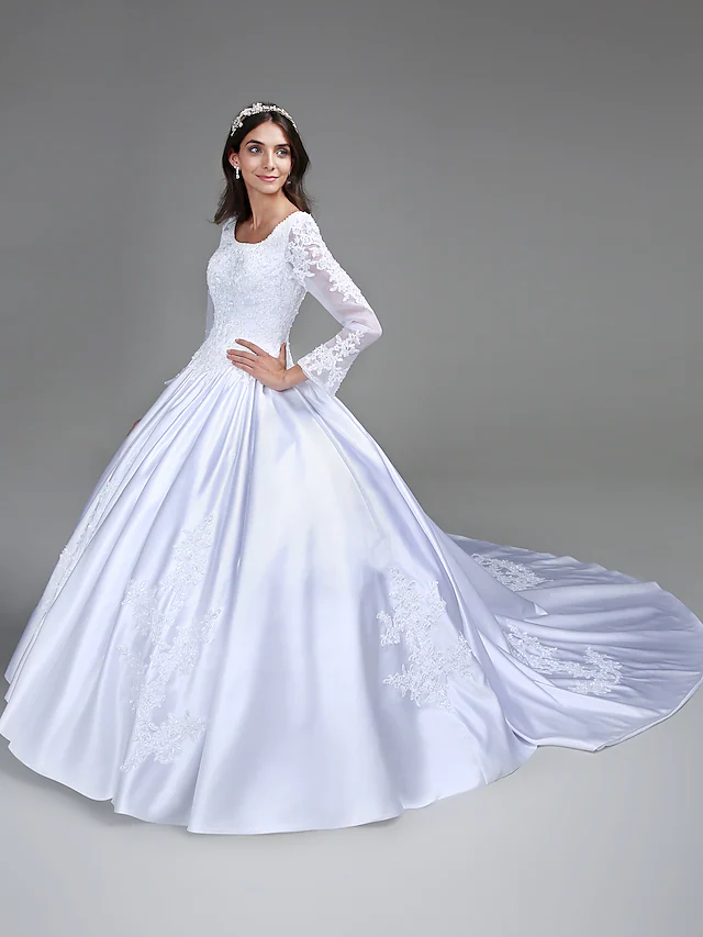 Back view of the vintage ball gown wedding dress, showcasing its full silhouette.