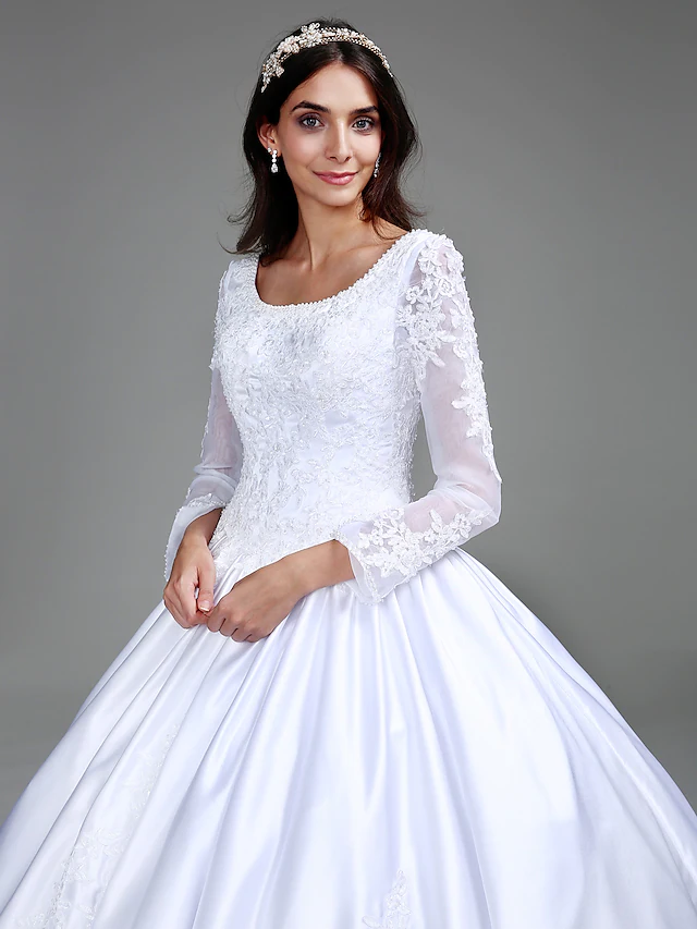 Full length view of the satin ball gown wedding dress, perfect for a classic bride.