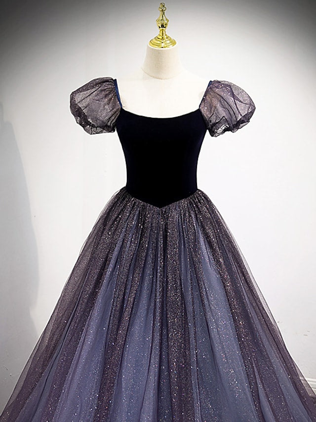 Back view of a sparkling sequin and tulle formal dress.