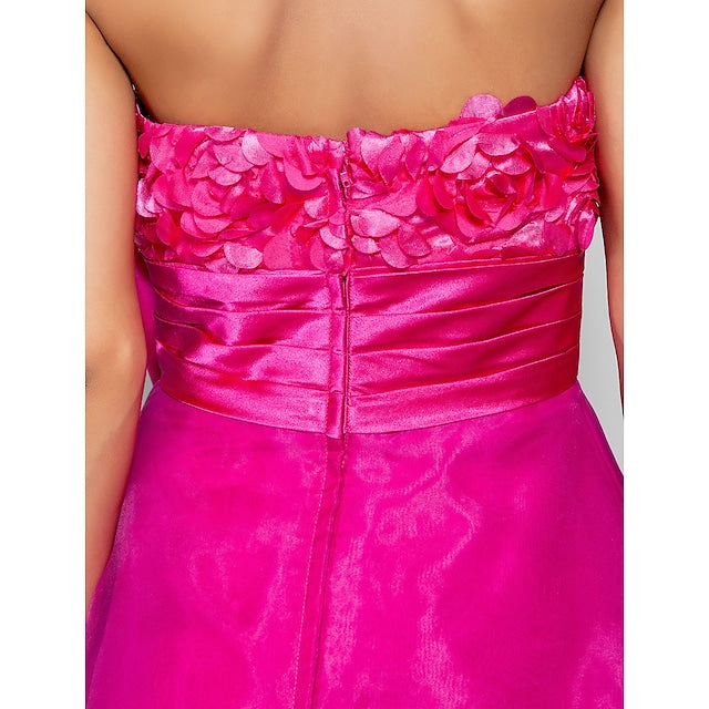 Full view of the knee-length party dress with a ribbon bow accent.