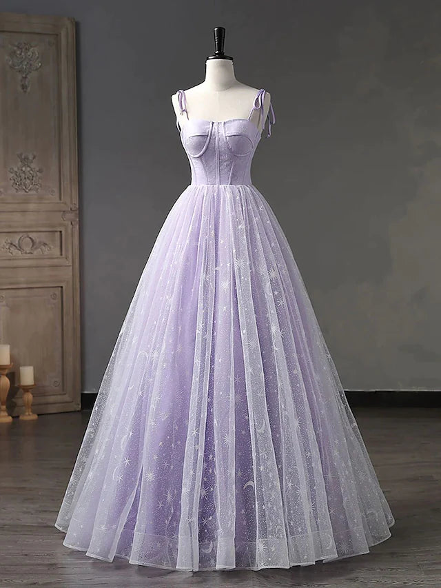 Side view of a formal floor-length ball gown dress.