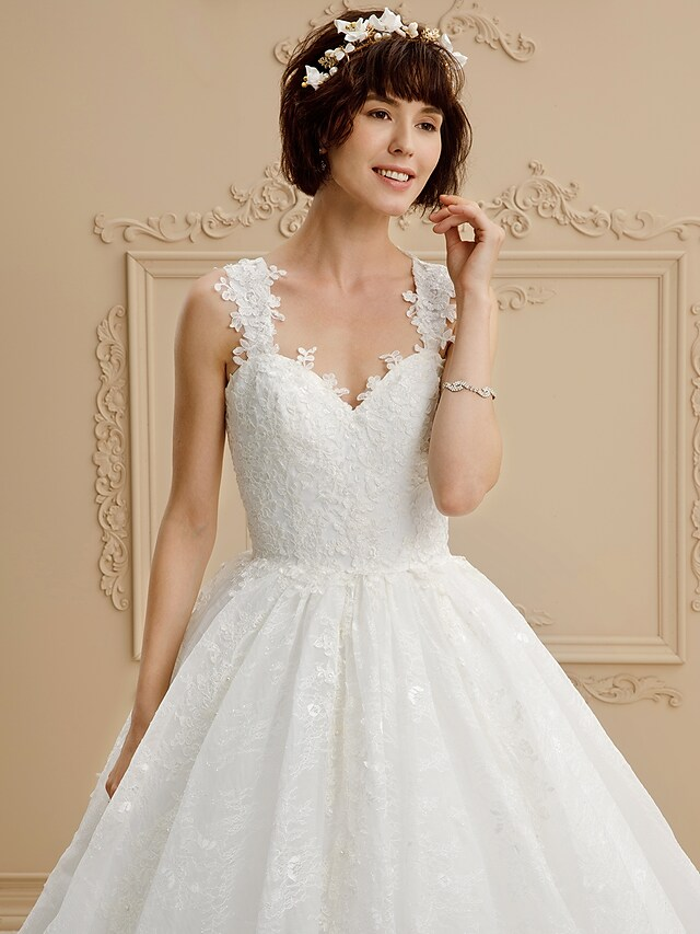 Side view of the glamorous ball gown with regular straps.