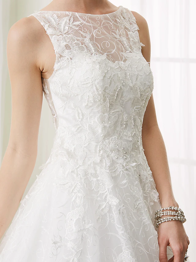 Flowing court train of the elegant bridal gown.