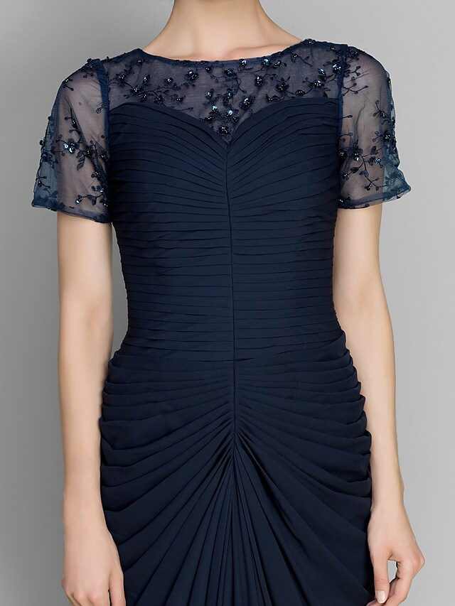 Mother of the Bride dress in motion, showing flowing chiffon fabric.