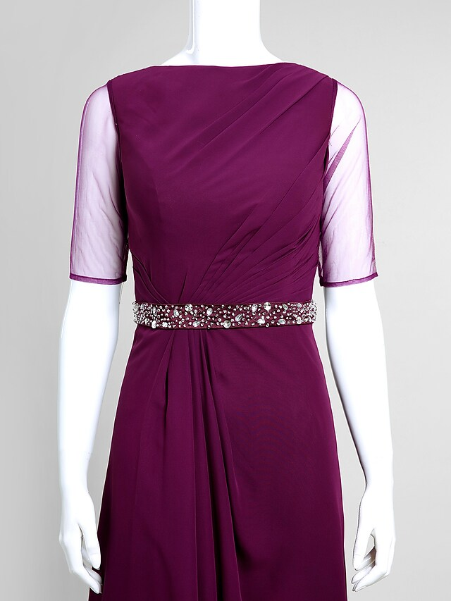 Beaded embellishments on the elegant Mother of the Bride dress.
