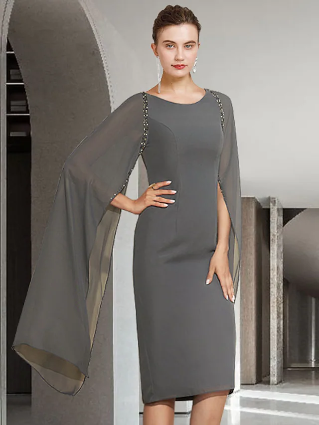 Elegant Mother of the Bride dress with jewel neck and long sleeves.