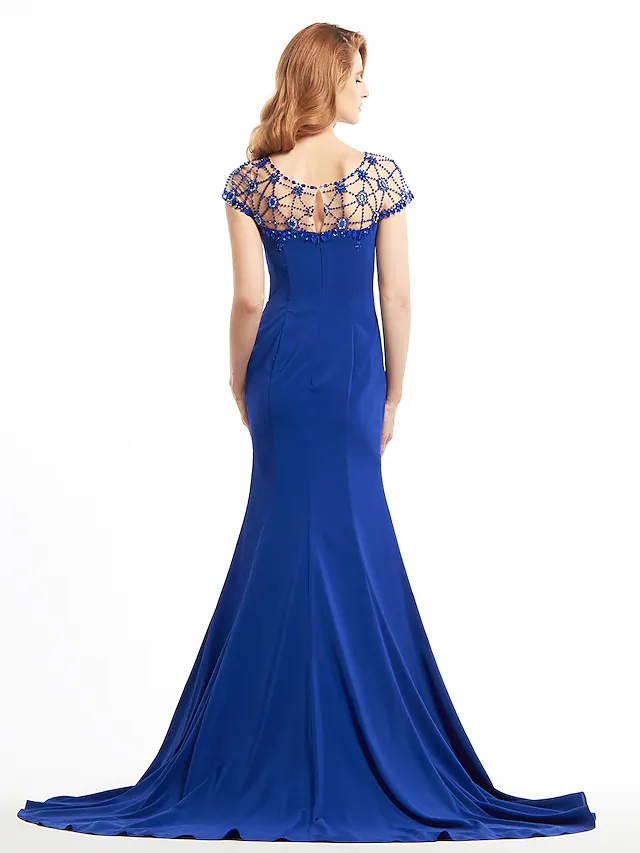 Full view of mermaid trumpet Mother of the Bride gown with short sleeves.