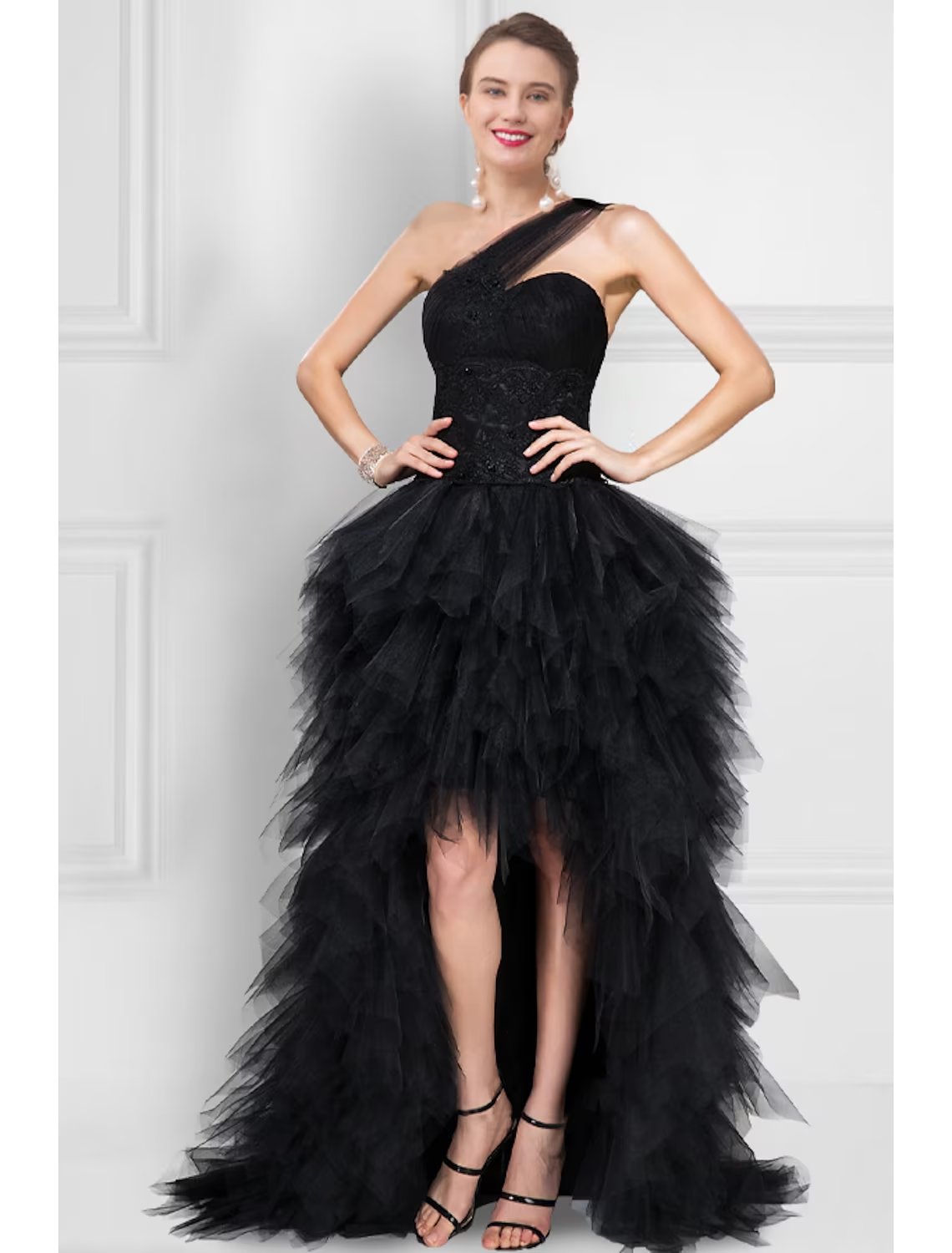 Front view of a black one-shoulder tulle ball gown prom dress.